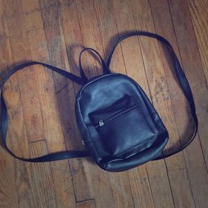 I am selling a mini book bag I got from old navy